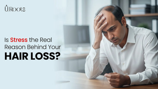 Stressed individual holding hair strands in their hand, questioning if stress is the real reason behind their hair loss.