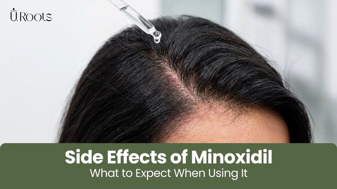 Close-up of a woman applying Minoxidil treatment to her hair part using a glass dropper.