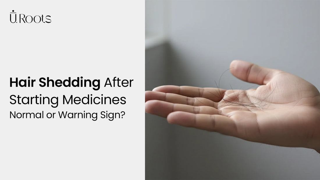 Hand holding shed hair strands, indicating hair fall after starting hair loss medications