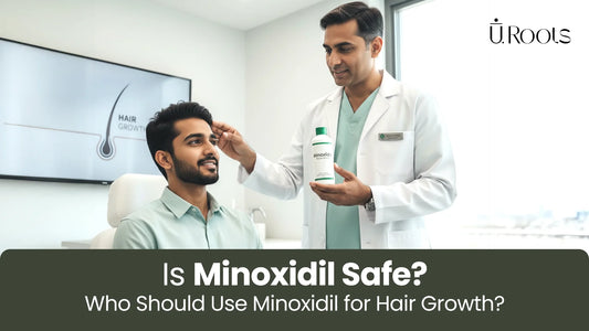A doctor in a white coat showing a bottle of Minoxidil to a smiling patient at U Roots clinic to discuss safety and hair growth.